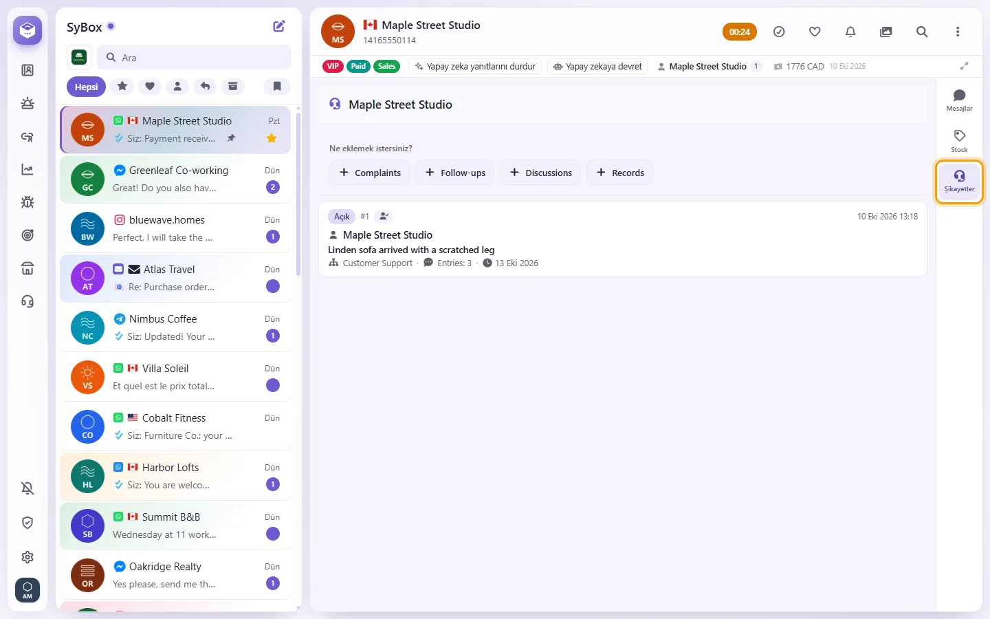 A conversation with its "Complaints" tab open beside it: the customer's cases